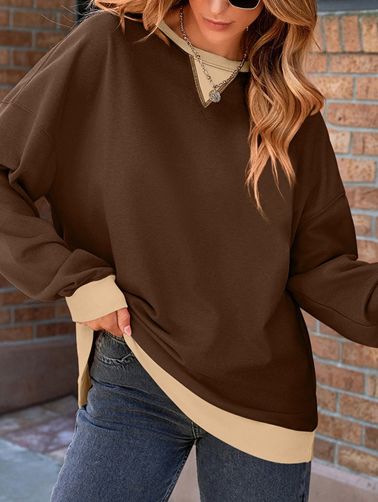 Contrast color splicing round neck sweater