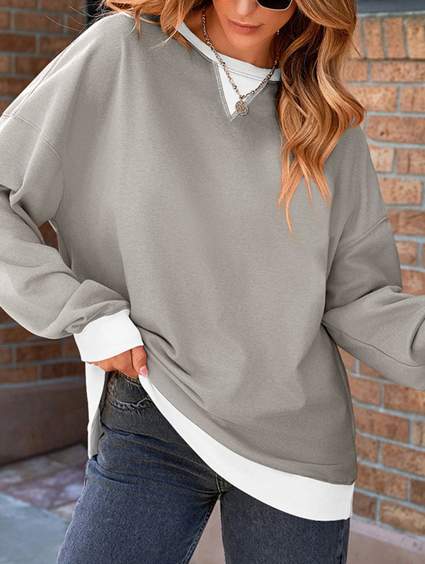 Contrast color splicing round neck sweater