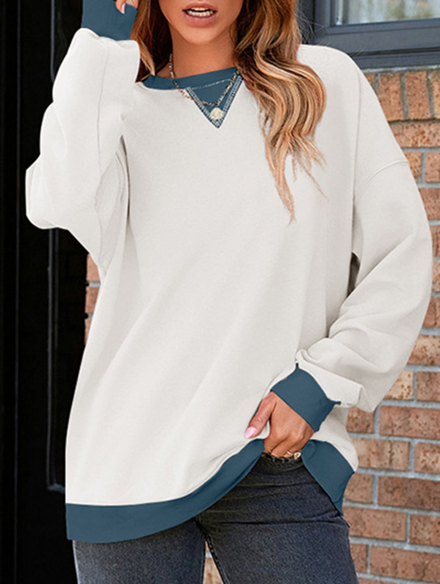Contrast color splicing round neck sweater