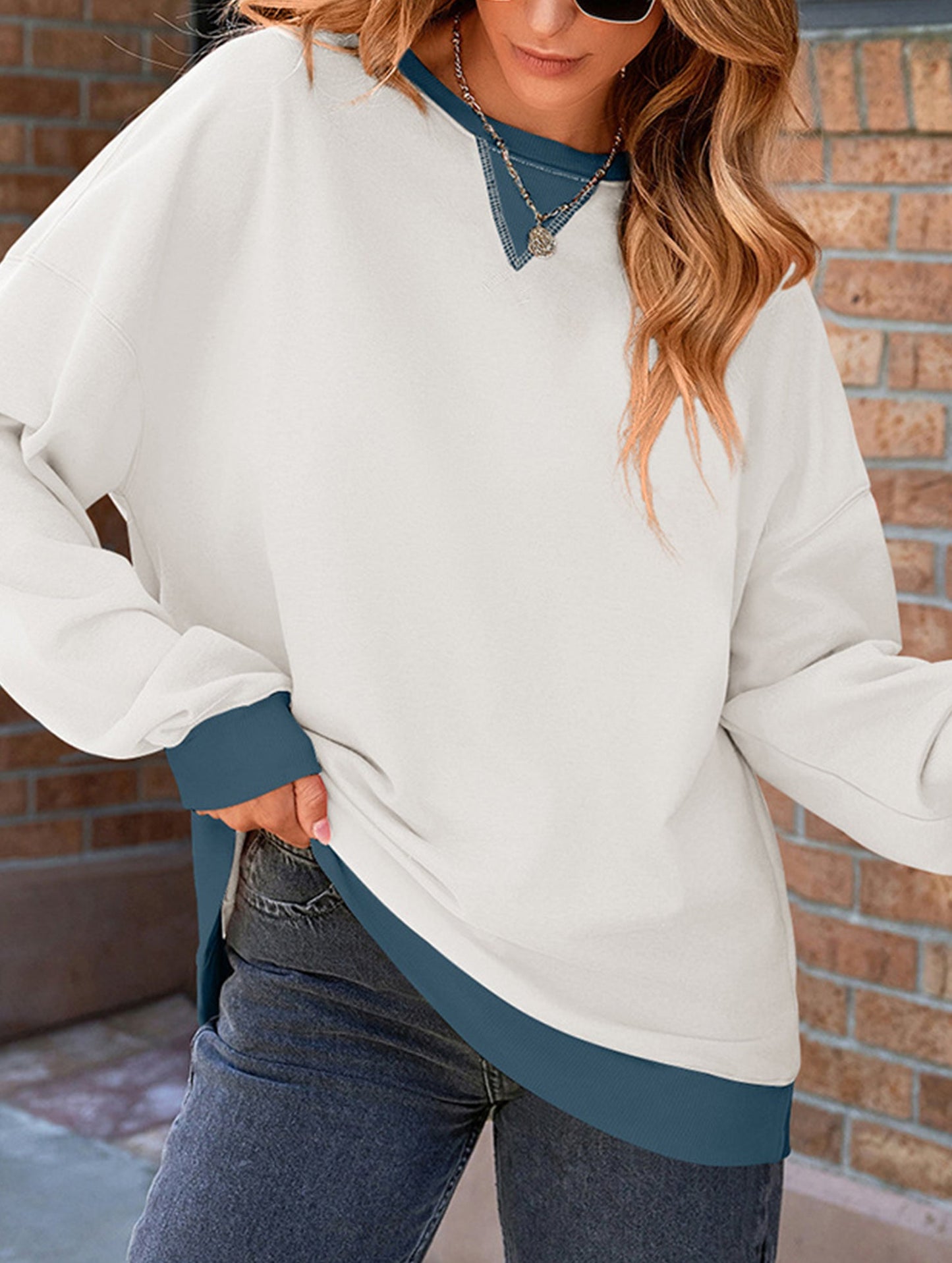 Contrast color splicing round neck sweater