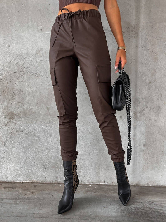 Waist-cinching street drawstring leather pants