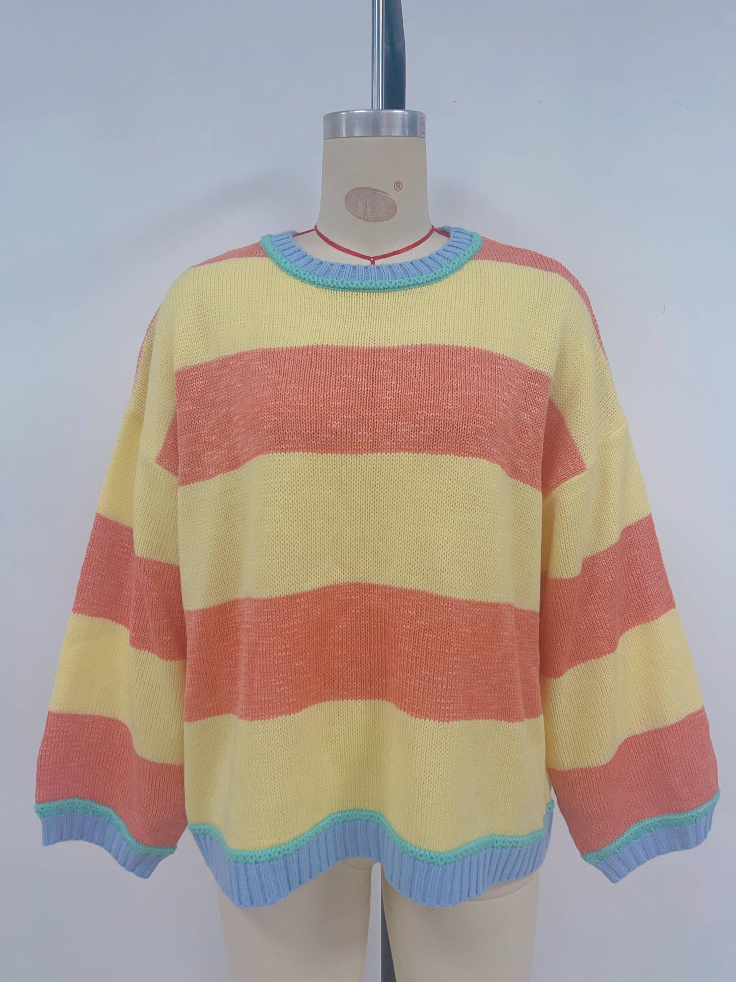 Knitted loose color-blocking striped sweater