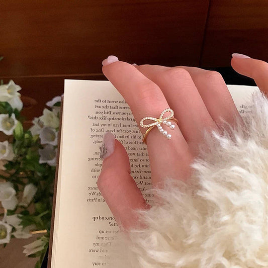 FASHIONABLE BOW SMALL PEARL RING FOR WOMEN_CWAJE3096