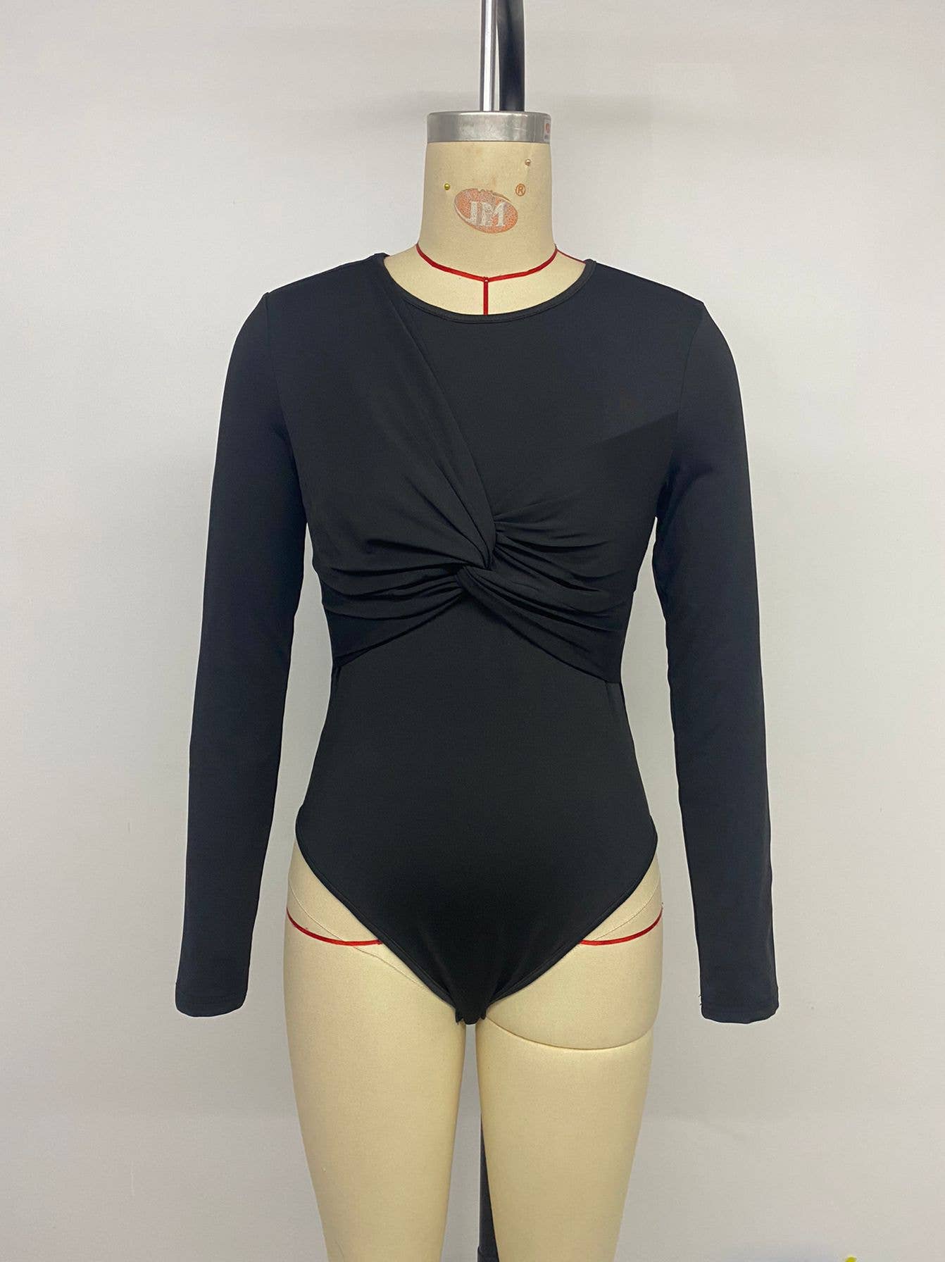 Solid-color knotted round-neck jumpsuit