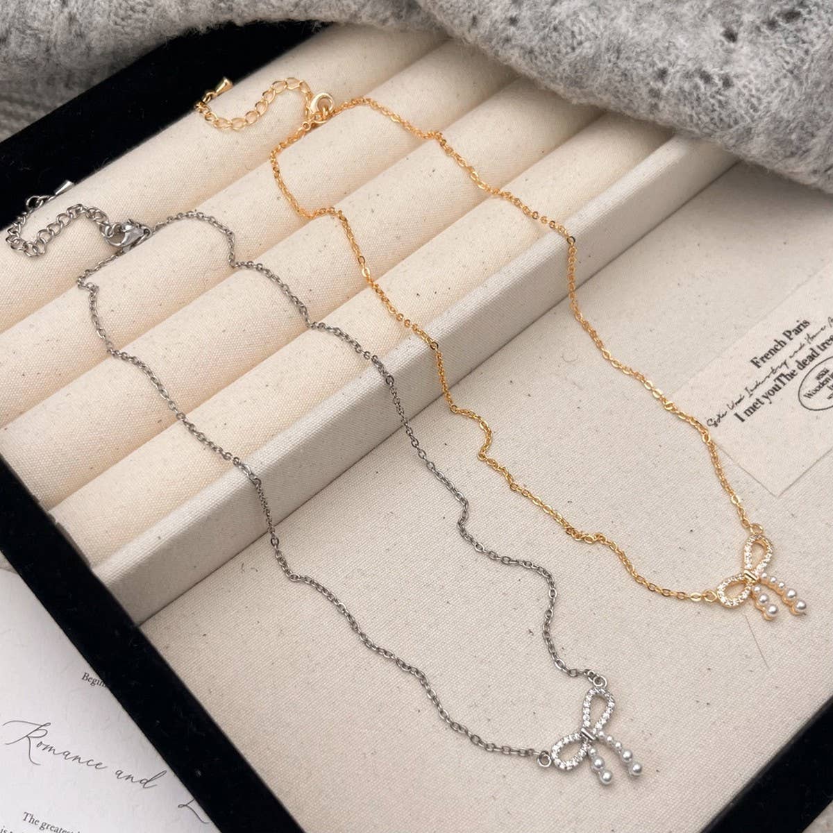 MICRO-PAVED ZIRCONIA PEARL BOW PENDANT NECKLACE