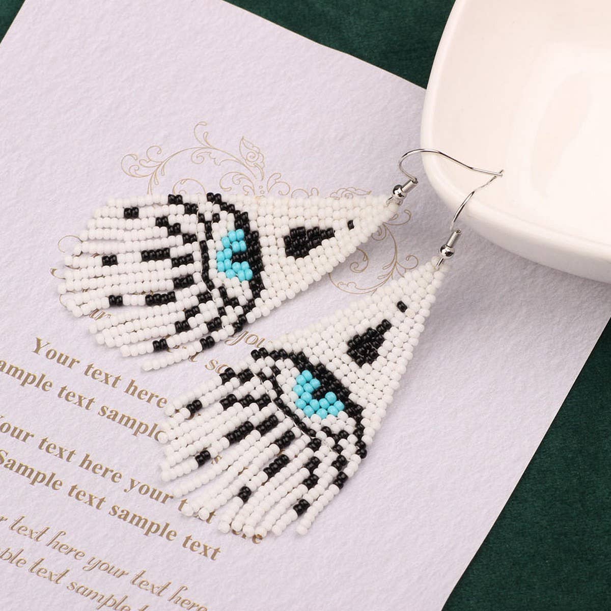 WESTERN DEVIL'S EYE BRAIDED TASSEL EARRINGS