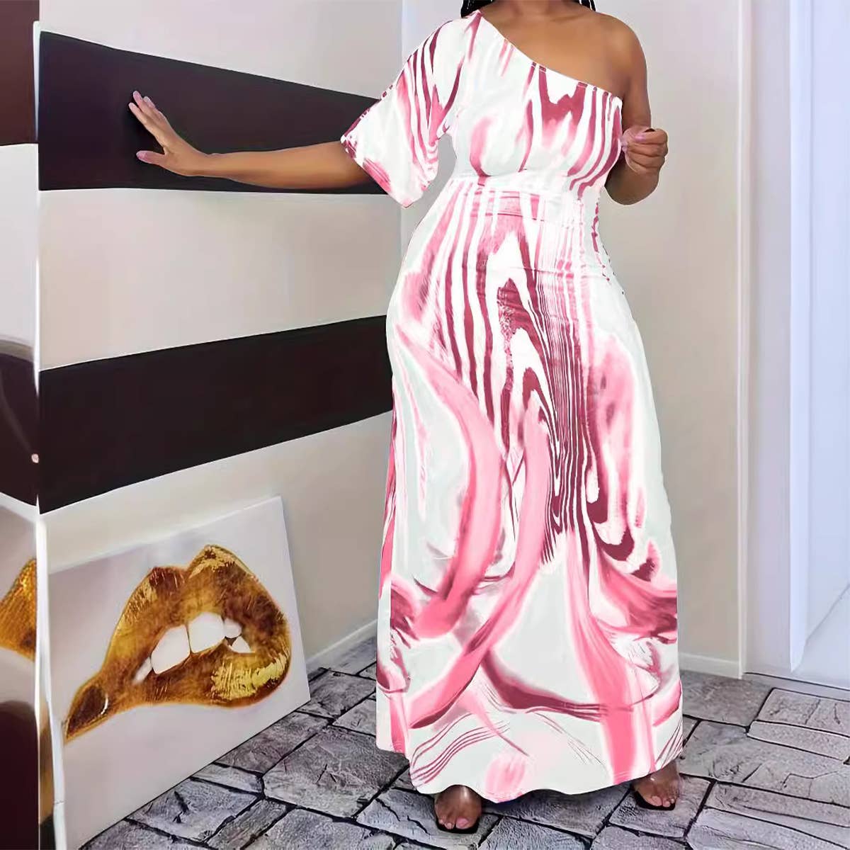 PRINTED ONE-SLEEVED DRESS WITH SLOPING SHOULDERS