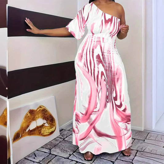 PRINTED ONE-SLEEVED DRESS WITH SLOPING SHOULDERS