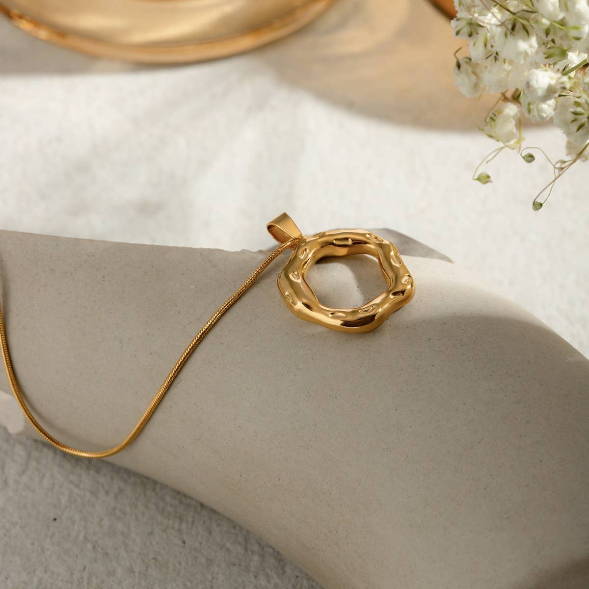 IRREGULAR HAMMERED ROUND SNAKE BONE NECKLACE