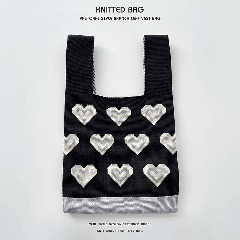 Heart-shaped color-blocked knitted handbag