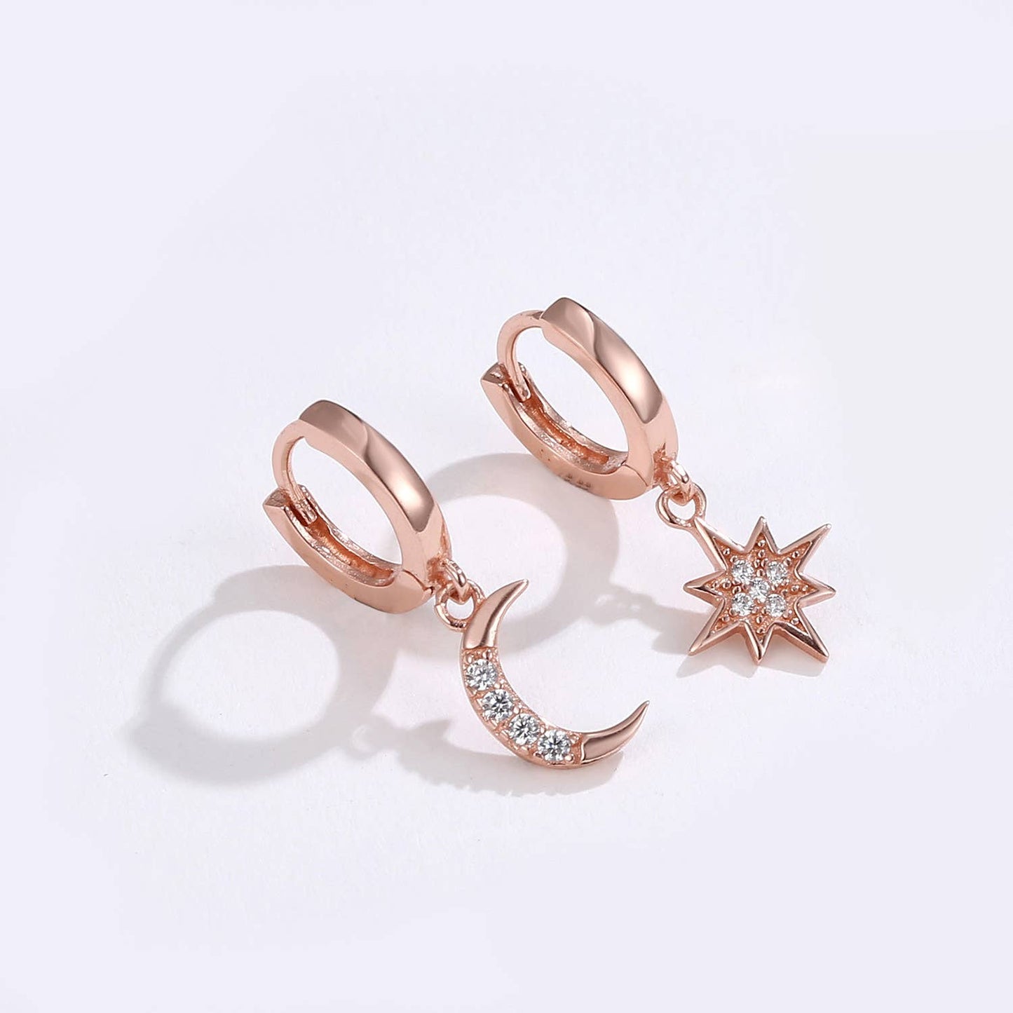 Asymmetric star-moon-ear diamond earrings