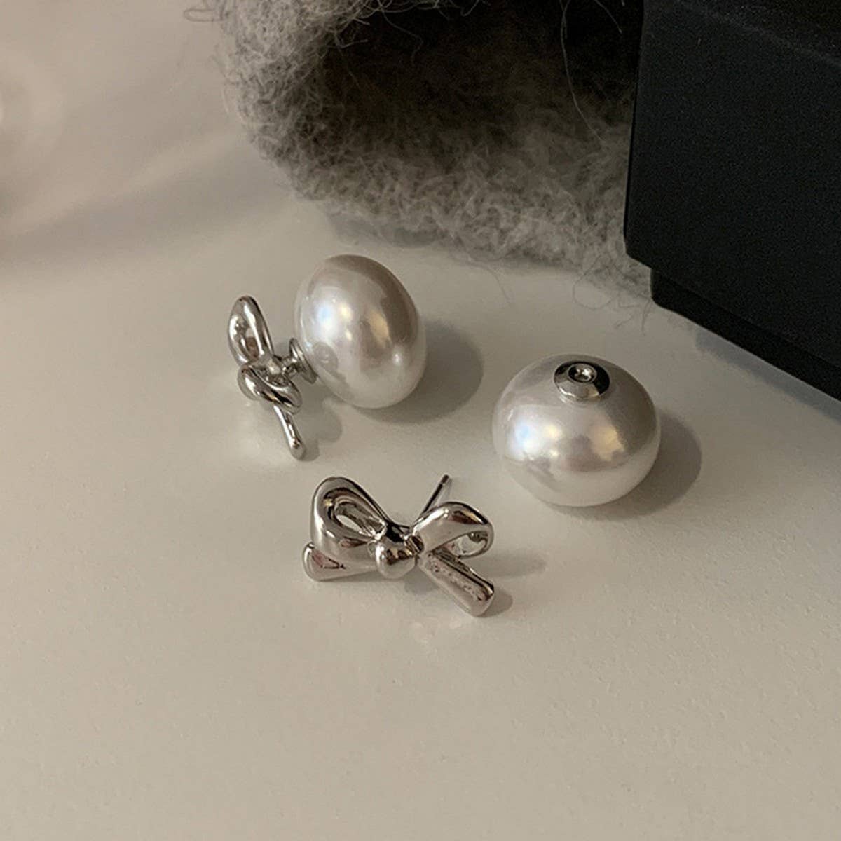 TEMPERAMENTAL AND HIGH-END BOW PEARL EARRINGS