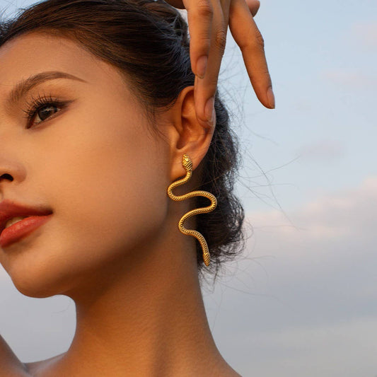 GOLD CURVED SNAKE DESIGN TITANIUM EARRINGS