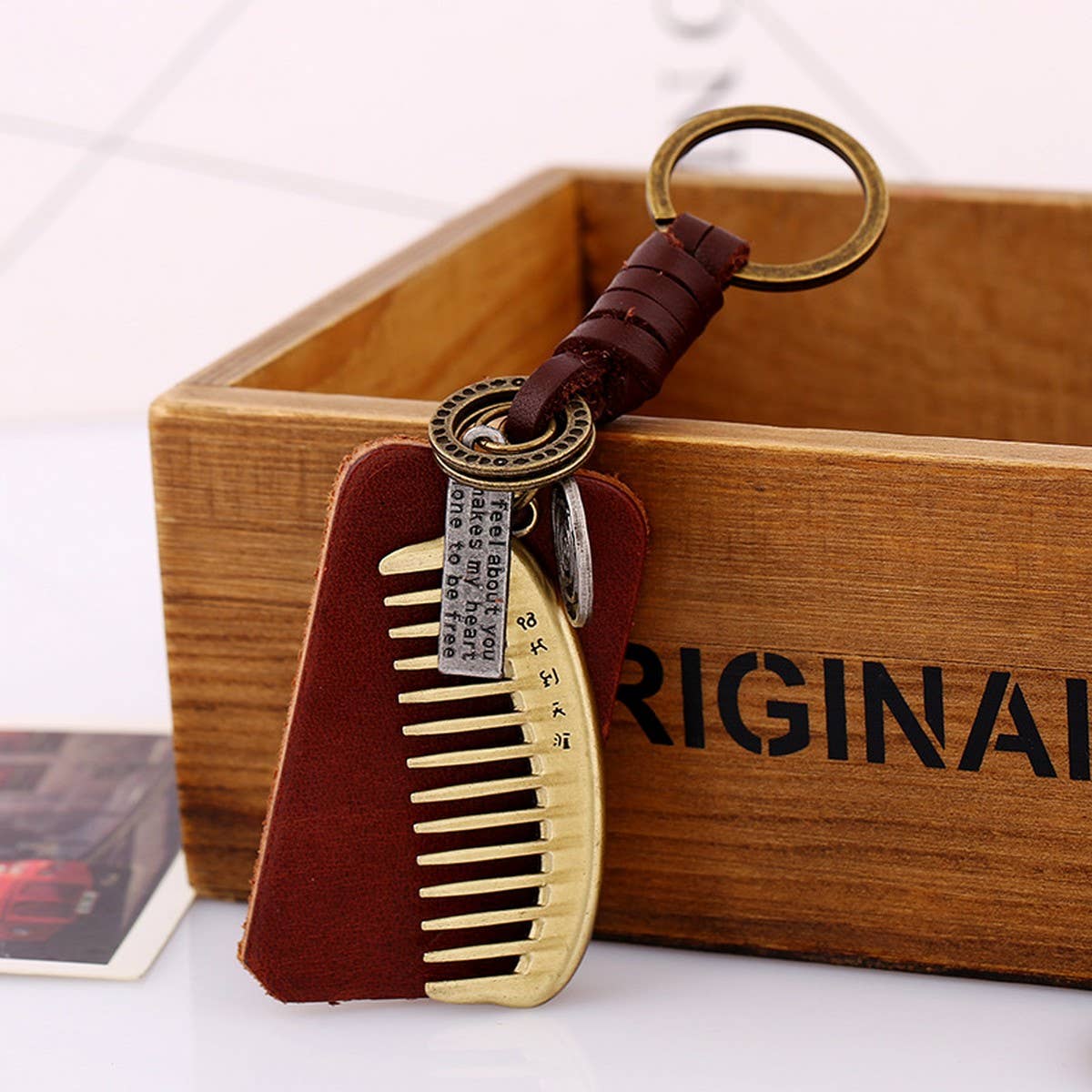 SIMPLE BRAIDED ALLOY COMB COWHIDE KEYCHAIN_CWMM4719