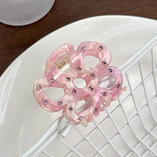 Hollowed-out flower diamond-encrusted grab clip
