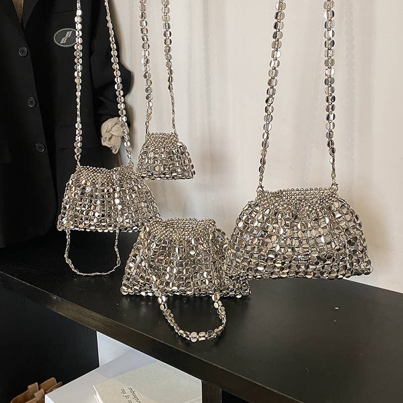 Fashionable hollowed-out glossy crossbody bag