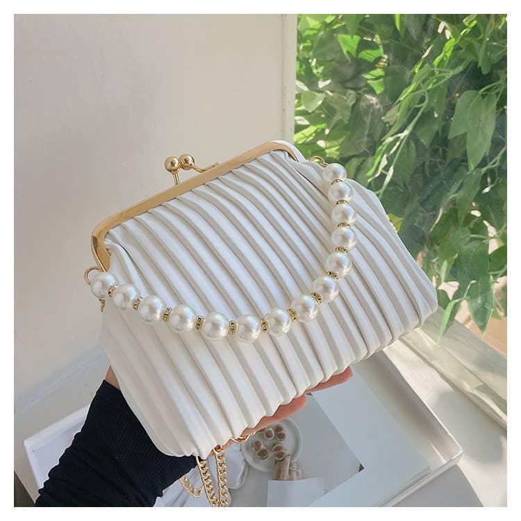 Pearl shell bag diagonally across the body