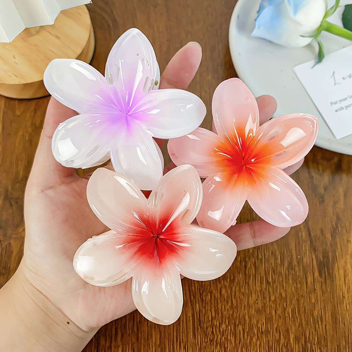 Frangipani hand-held vintage flower hair clips