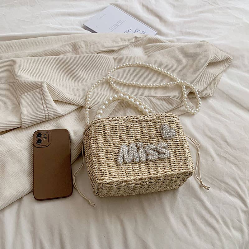Single-shoulder pearl hand-held woven bag
