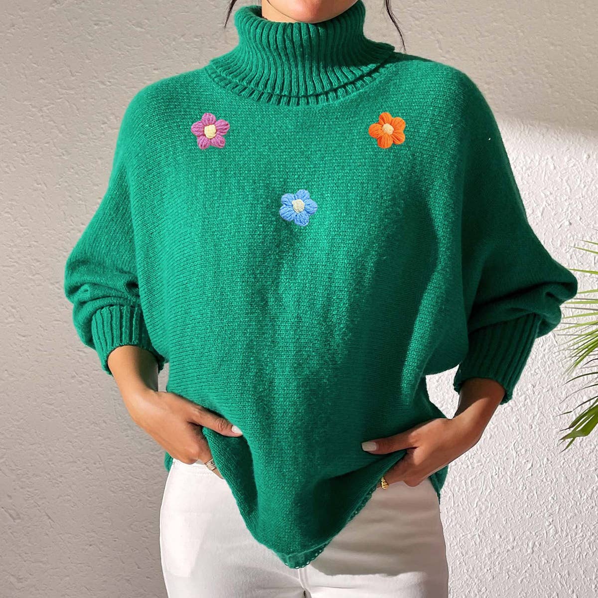 Simple hand-crocheted turtleneck sweater in a solid color