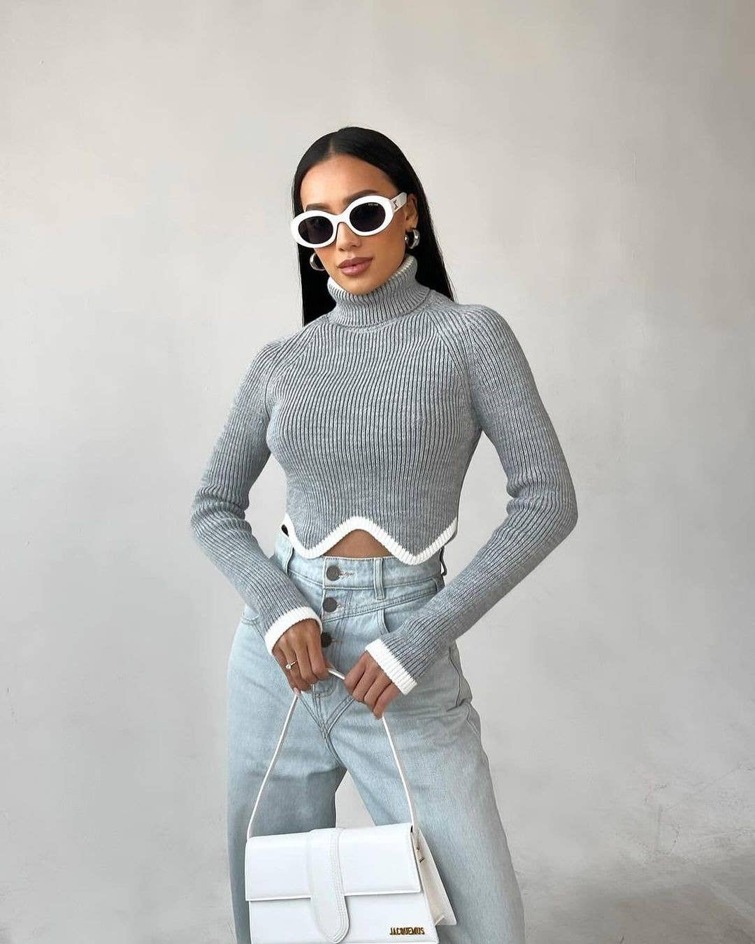 SHORT TIGHT TURTLENECK AND IRREGULAR HEM SWEATER