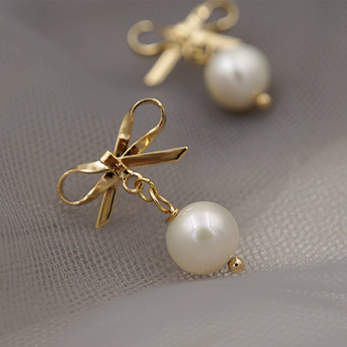 FASHIONABLE AND VERSATILE BOW PEARL EARRINGS_CWAJE1681