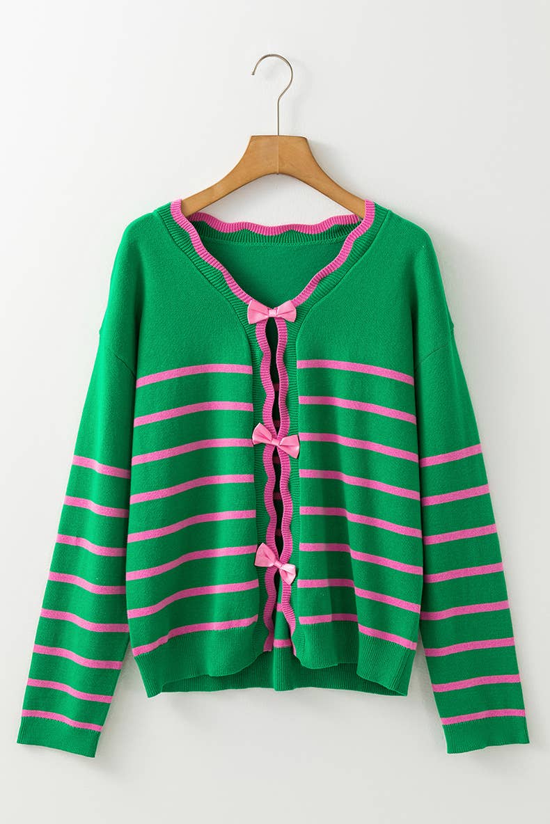 STYLISH AND PLAYFUL AGE-REDUCING BOW SWEATER