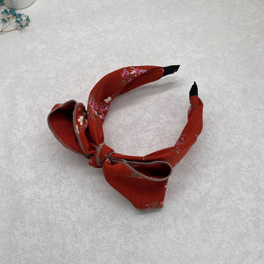 WIDE-BRIMMED FLORAL BOW HEADBAND