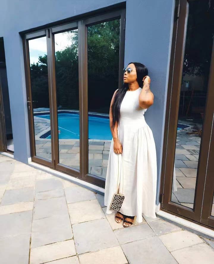 Sleeveless solid-color vest dress with large hem