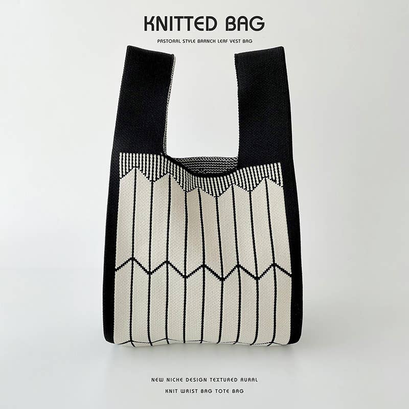 Heart-shaped color-blocked knitted handbag