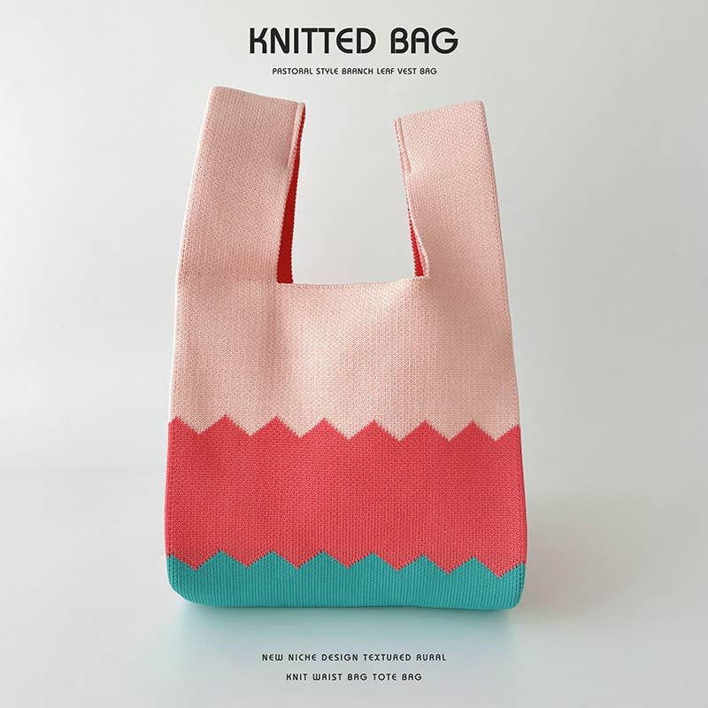Heart-shaped color-blocked knitted handbag