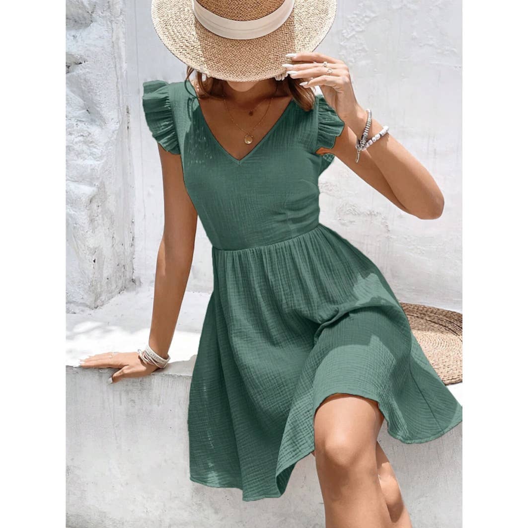 Backless ruffled solid-color cinched-waist dress