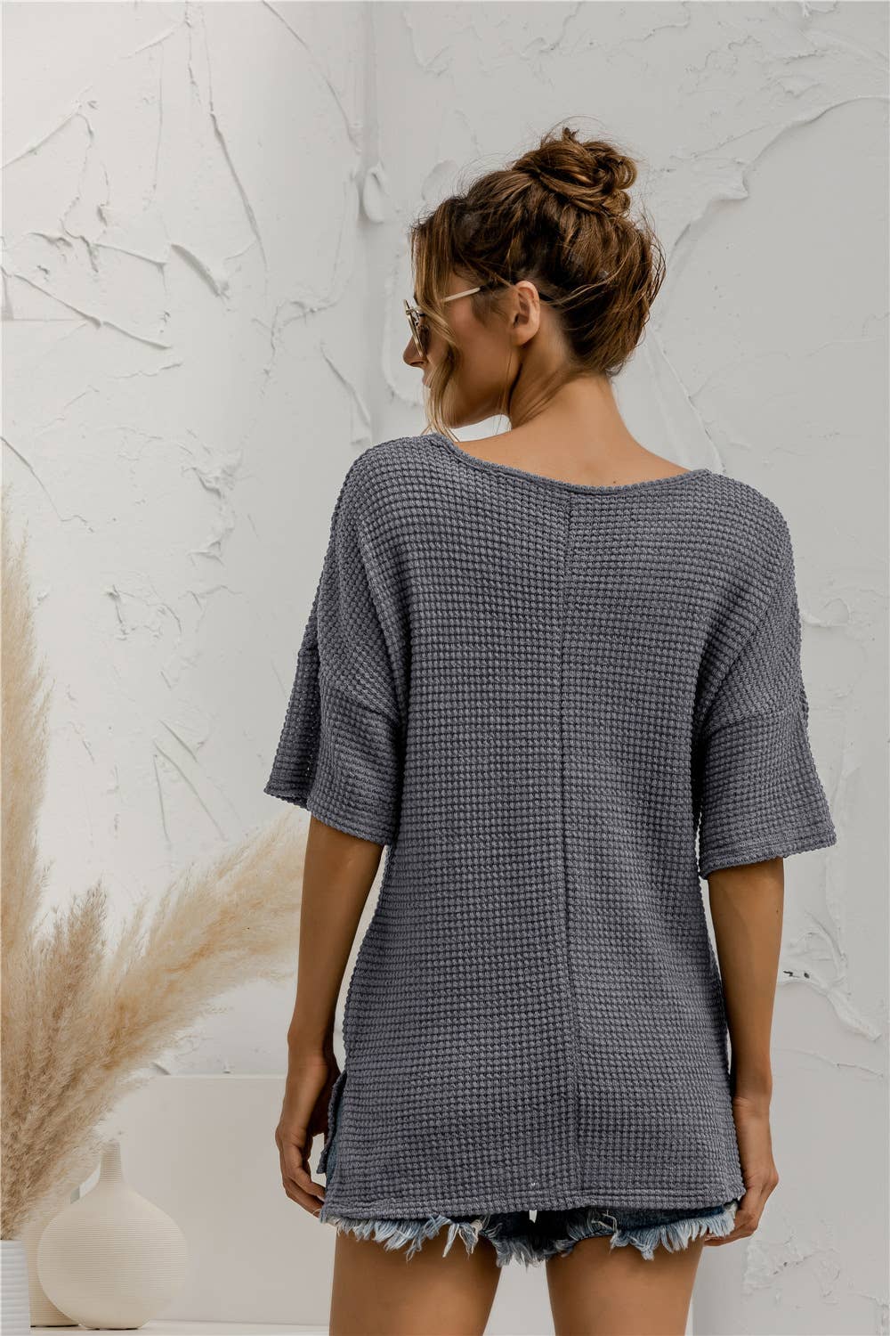 V-neck pocket slit solid-color knitted top