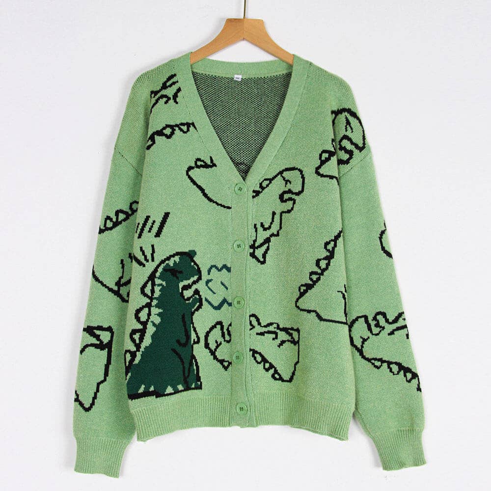 THE JACKET IS A LOOSE CARTOON DINOSAUR CARDIGAN