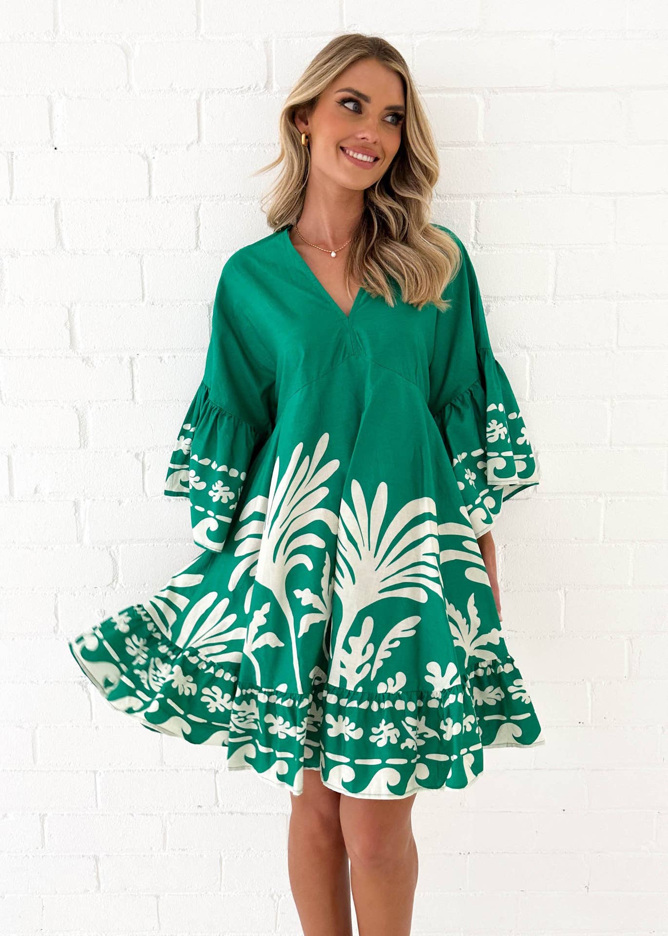 PRINT V-NECK DRESS WITH FLARED SLEEVES