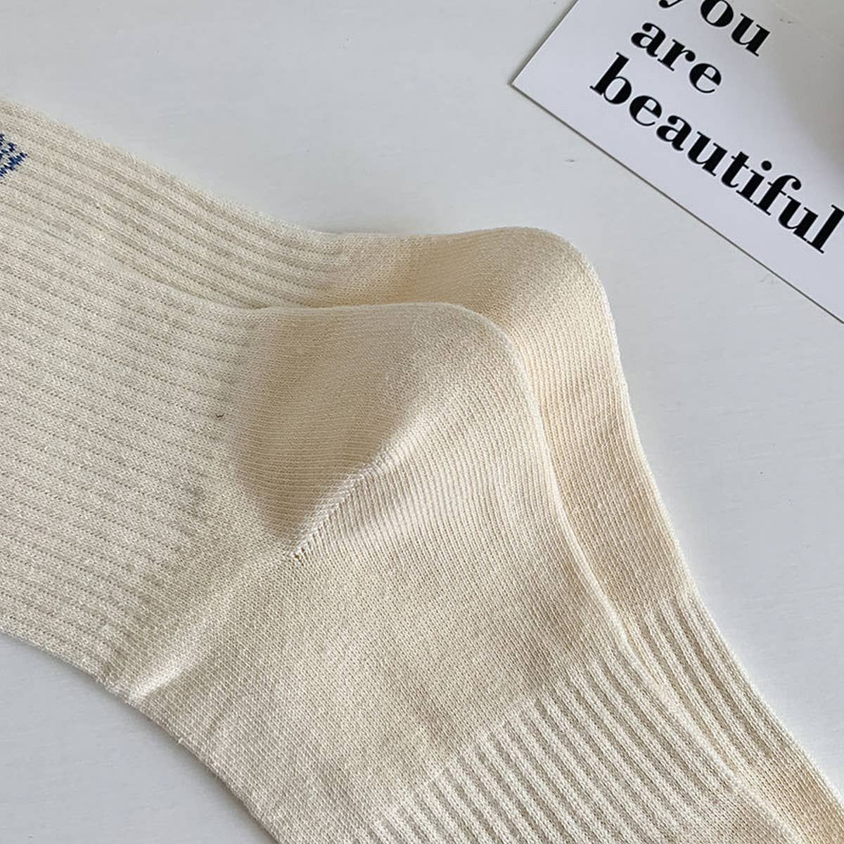 STRIPED COLOR BLOCK LETTERING SPORTS SOCKS_CWMS0964