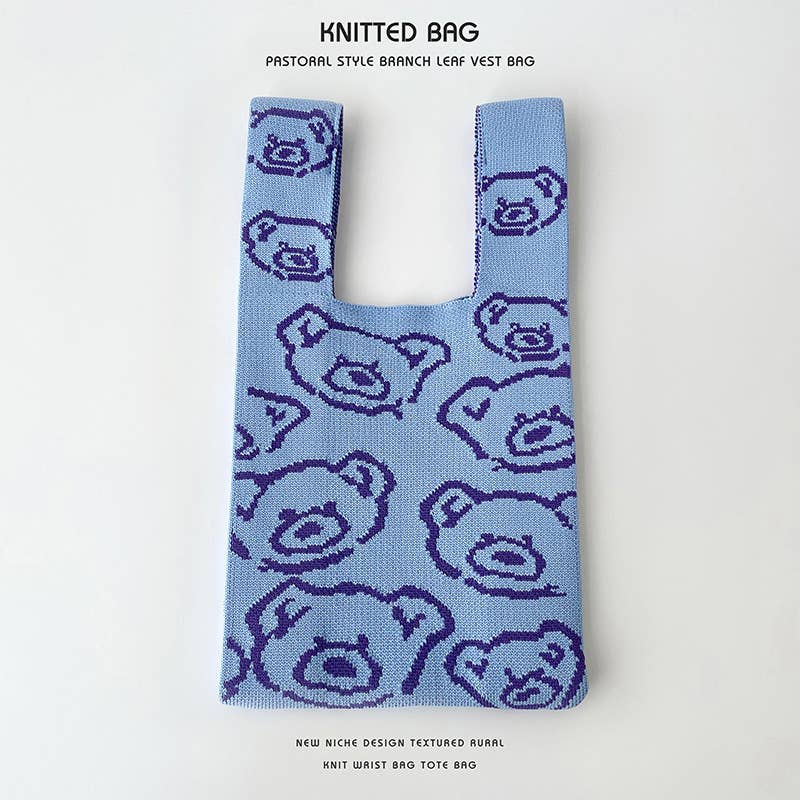 Heart-shaped color-blocked knitted handbag