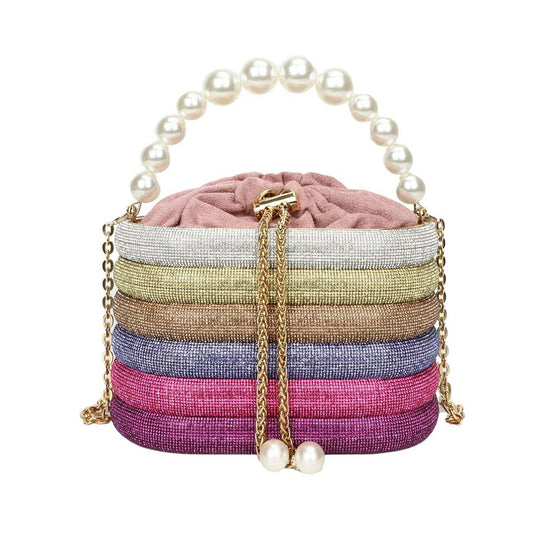 Slung over a pearl sparkling handbag
