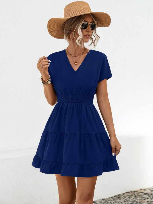 A V-neck solid color cinched short dress