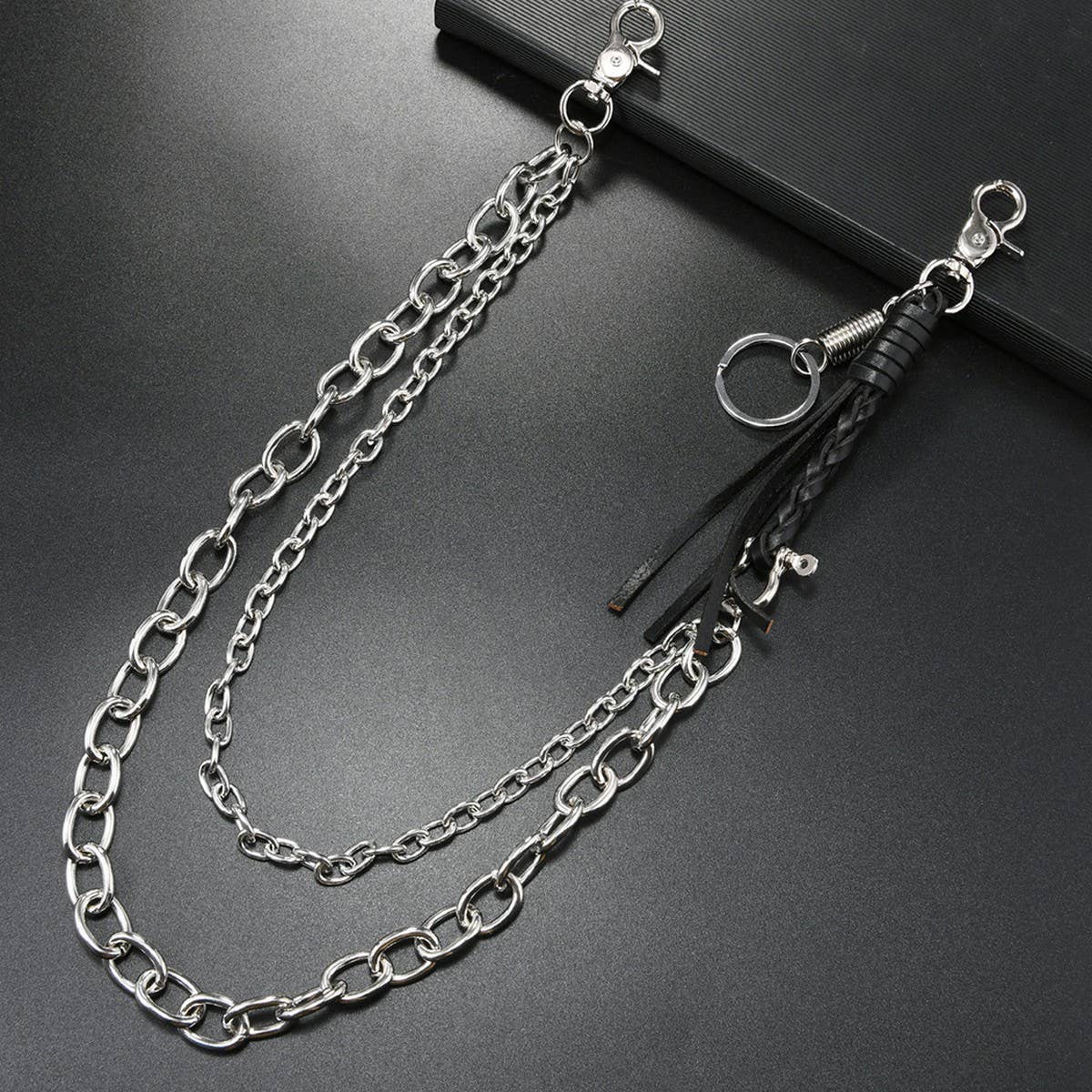 FASHIONABLE COWHIDE BRAIDED TASSEL PANTS CHAIN