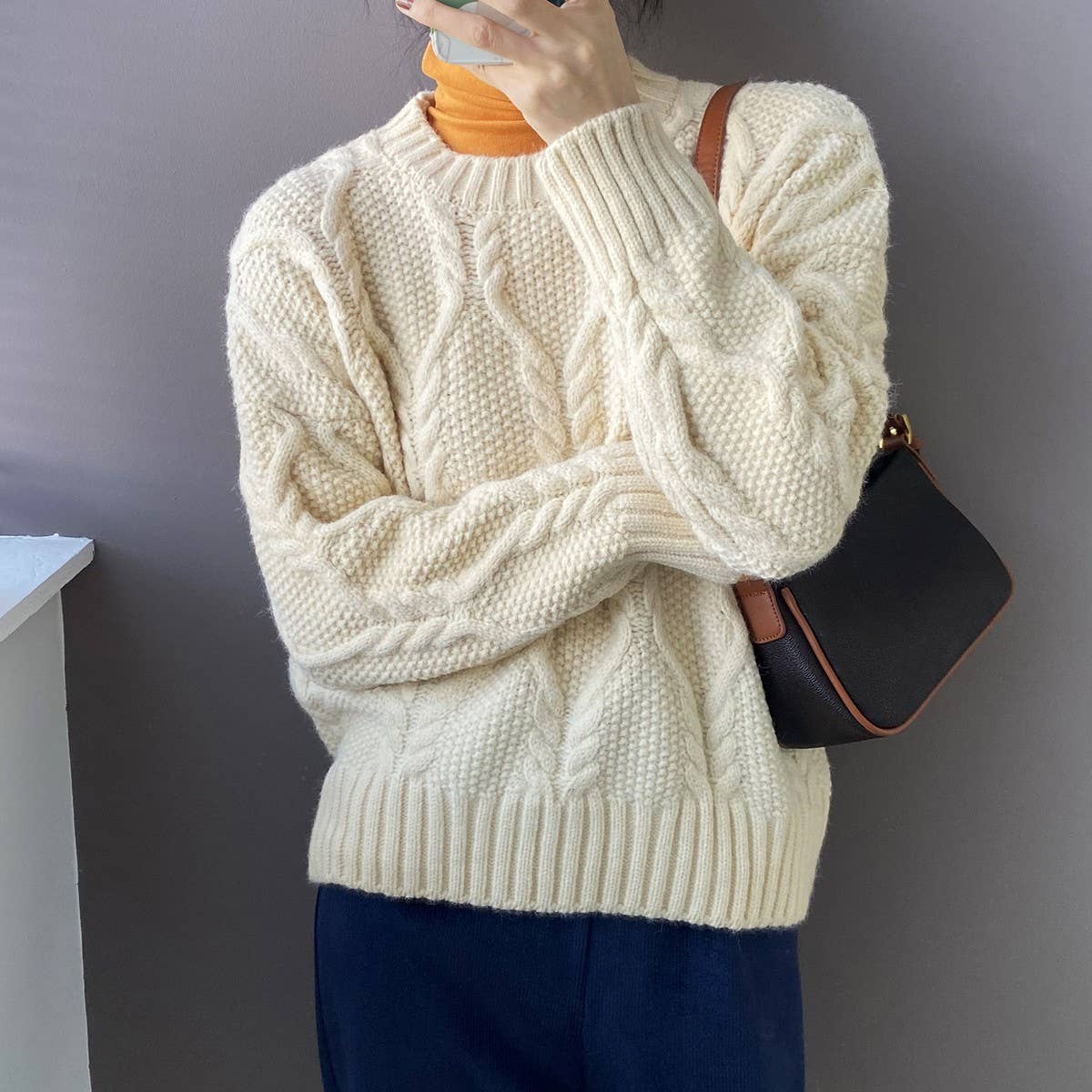 Twist loose solid color crew neck pullover sweater