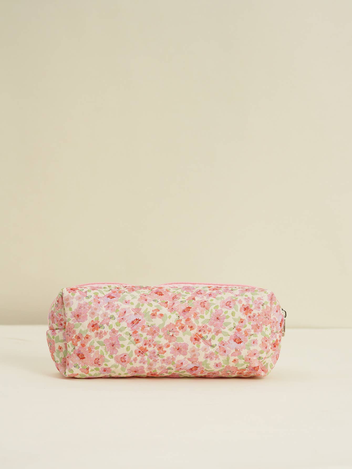 Four-piece set of quilted floral makeup bags