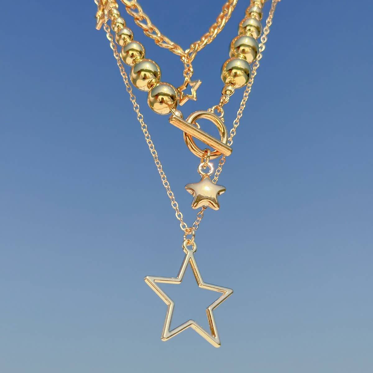 BEADED NECKLACE WITH STAR SHAPED PENDANT TASSELS_CWAJE1158
