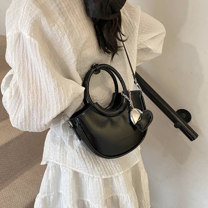 Fashionable and versatile hand-held crossbody bag