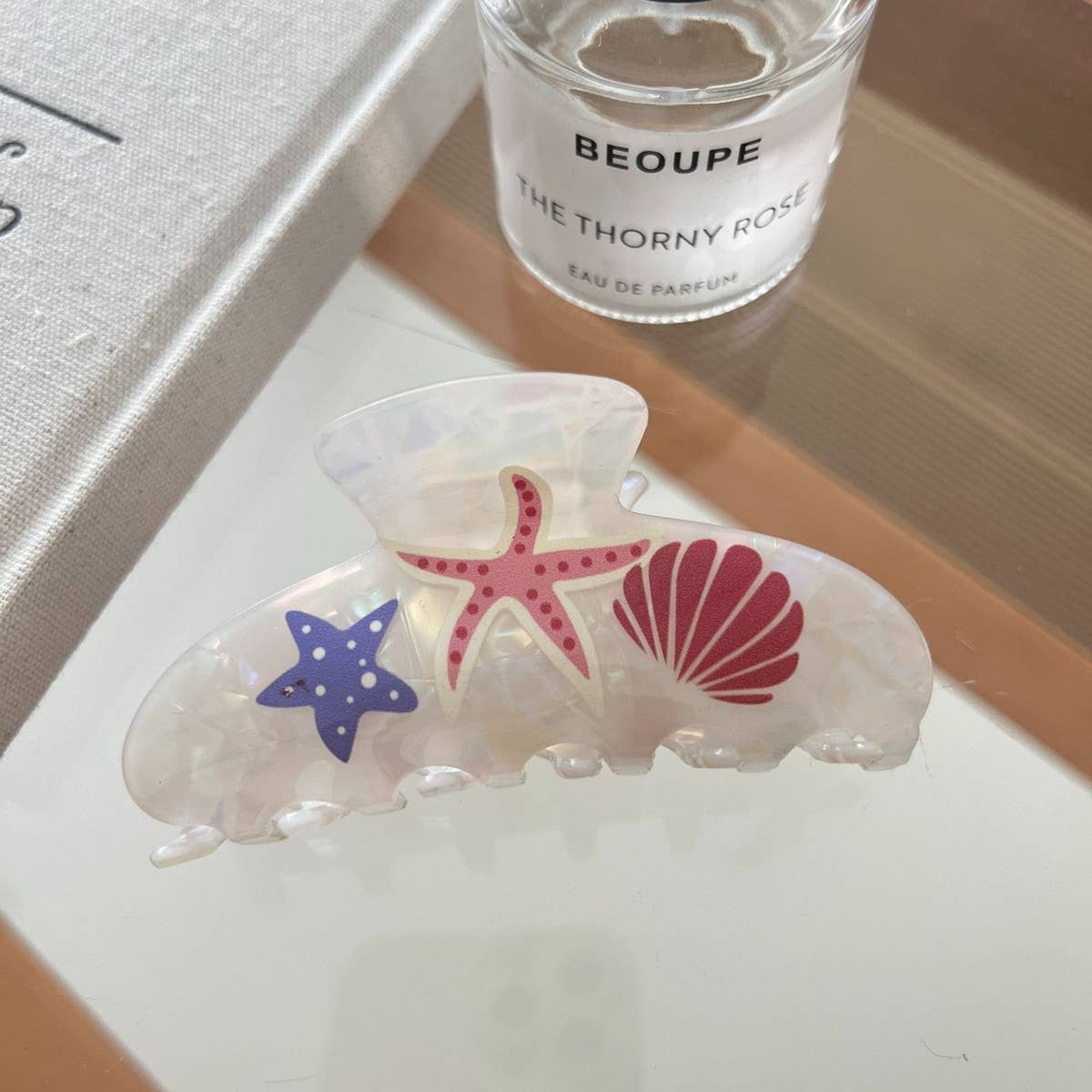 CWAHA07745_ACETATE STARFISH OCEAN SHARK HAIR CLAW CLIP