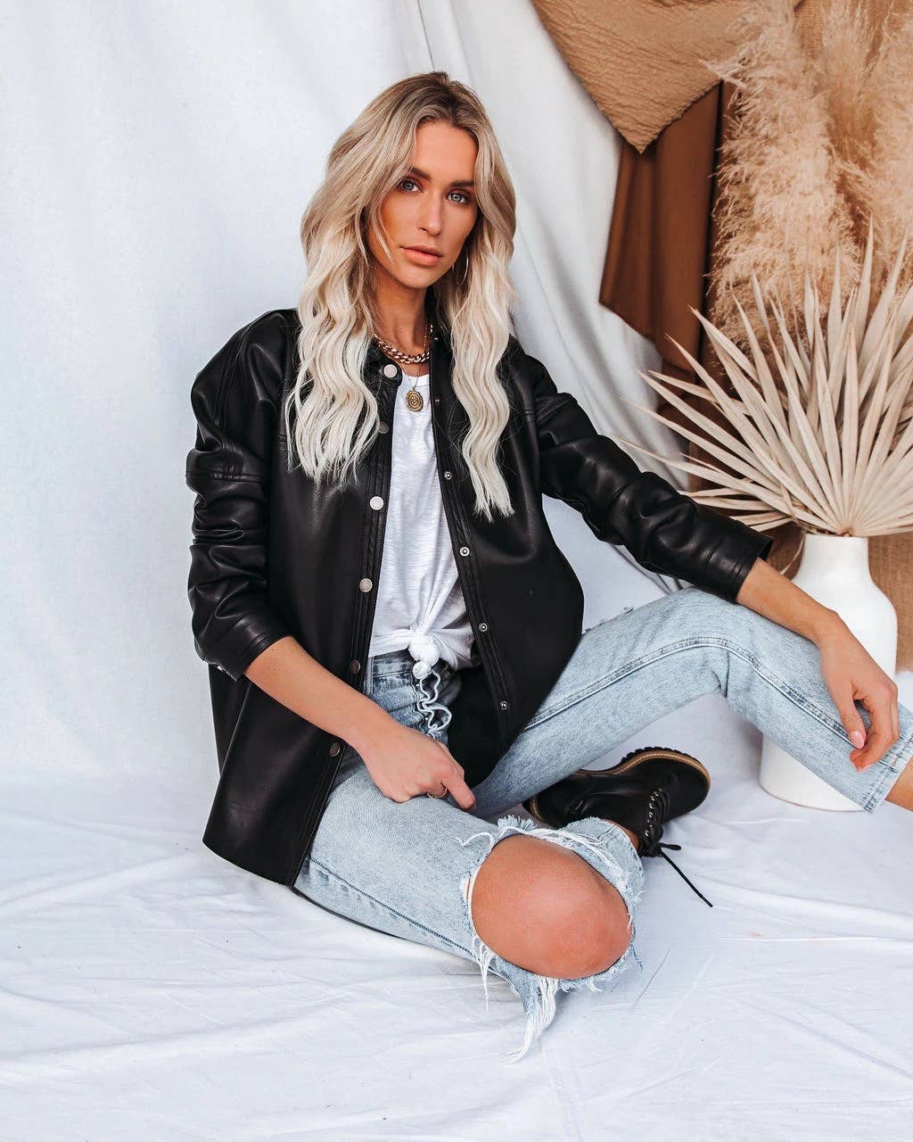 Lapel solid-color long-sleeved leather jacket