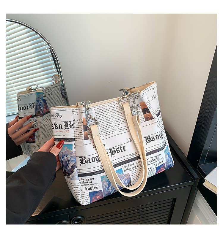 Newspaper printed large-capacity bucket bag