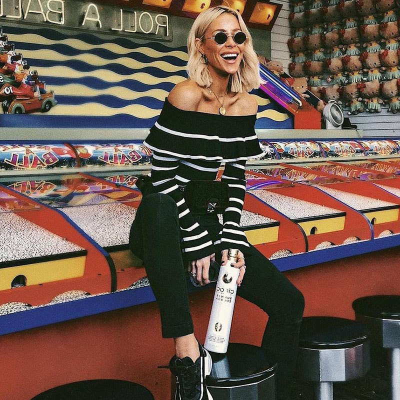 Striped ruffled one-neck knitted sweater