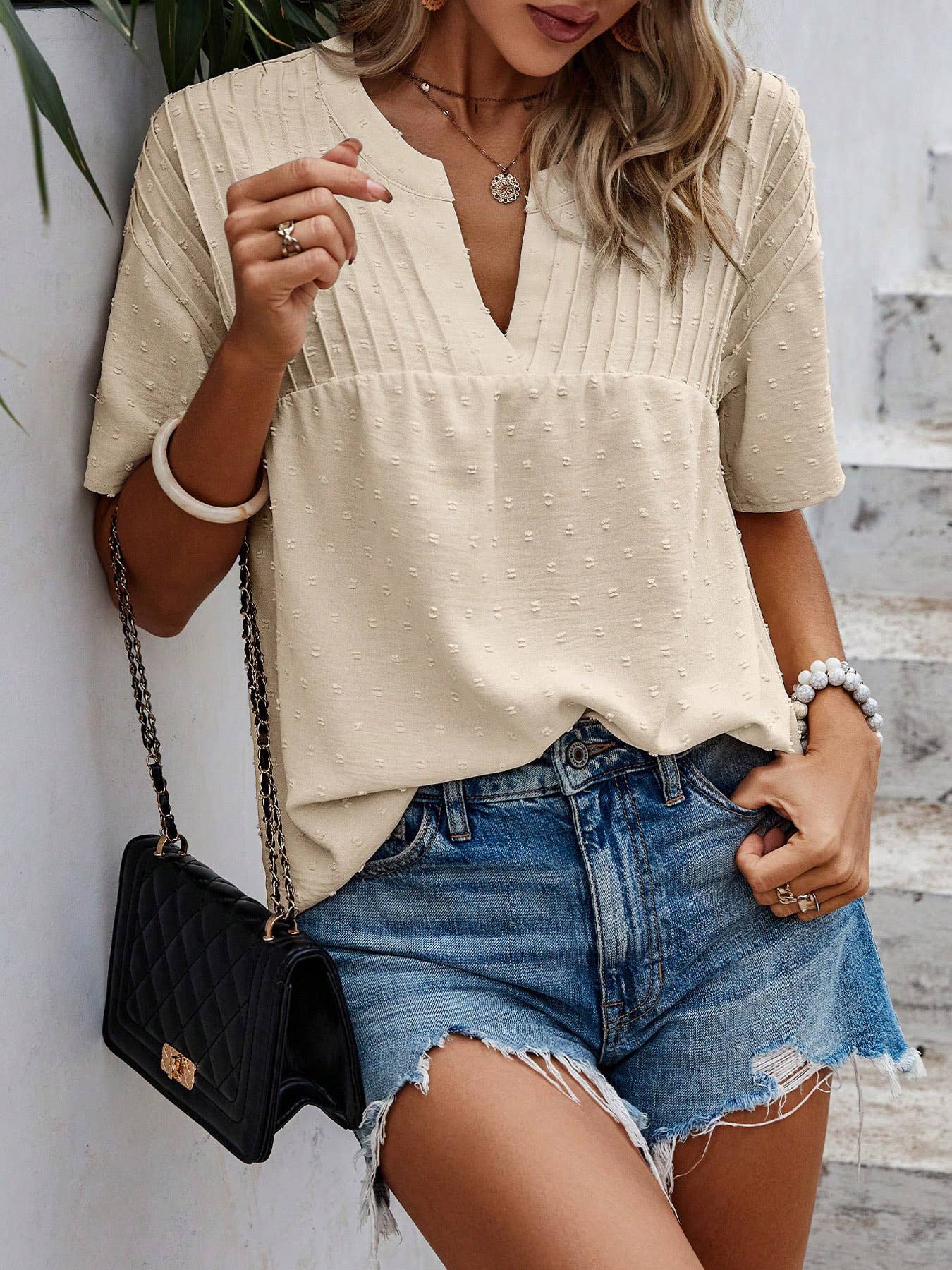 SWISS POLKA DOT PLEATED TOP WITH A CUT NECK