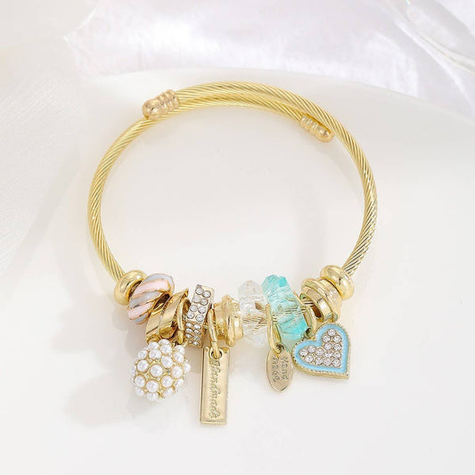 Gold Bracelet with Tree, Heart & Tail Charms